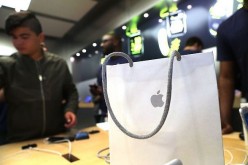 People buy the new iPhone's at an Apple store in Manhattan on September 16, 2016 in New York City. 