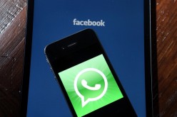 Facebook and WhatsApp logos are displayed on portable electronic devices on Feb. 19, 2014 in San Francisco City.