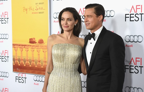 Angelina Jolie Pitt (L) and Brad Pitt attend the opening night gala premiere of Universal Pictures' 'By the Sea' during AFI FEST 2015 presented by Audi at TCL Chinese 6 Theatres on November 5, 2015 in Hollywood, California.