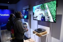 Fans try out PlayStation 4 Pro demos at the midnight launch event at Sony Square NYC on November 9, 2016 in New York City. 
