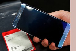 A Samsung Galaxy Note 7 is held up with other Note 7 phones on a counter that were returned to a Best Buy on Sept. 15, 2016 in Orem, Utah. 