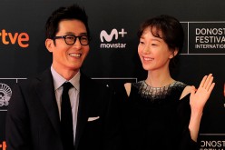 South Korean actor Kim Joohyuck (L) and actress Lee Yoo-Young (R) pose during a photocall after the screening of their film 'Dangsinjasingwa Dangsinui Geot' (Yourself and Yours) at the 64th San Sebastian Film Festival, in the northern Spanish Basque city 