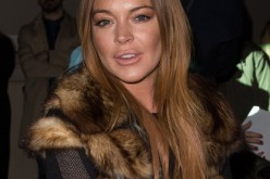 Lindsay Lohan attends the Gareth Pugh show during London Fashion Week Fall/Winter 2015/16 at Victoria & Albert Museum on February 21, 2015 in London, England