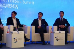 (L-R) Jack Ma, chairman and CEO of Alibaba Group; Li Yanhong, CEO of Baidu.com; and Liu Qiangdong, CEO of JD.com, attend the 2014 World Internet Conference.
