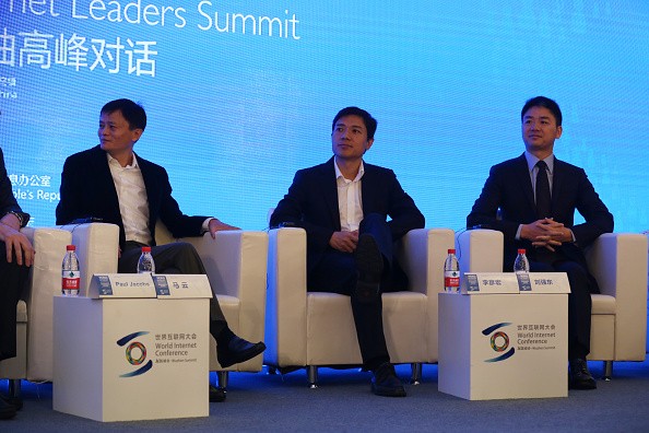 (L-R) Jack Ma, chairman and CEO of Alibaba Group; Li Yanhong, CEO of Baidu.com; and Liu Qiangdong, CEO of JD.com, attend the 2014 World Internet Conference.