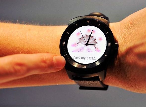 A model displays the LG G Watch R at the LG booth during the 2015 International CES at the Las Vegas Convention Center on January 6, 2015 in Las Vegas, Nevada.