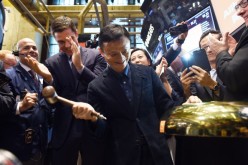 Alibaba founder and executive chairman Jack Ma rings a bell to open trading on the floor at the New York Stock Exchange in New York in 2014.