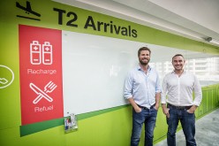Maximilian Bittner, chief executive officer of Lazada Group SA, and Roger Egan, co-founder and chief executive officer of RedMart, pose for a photograph in Singapore.
