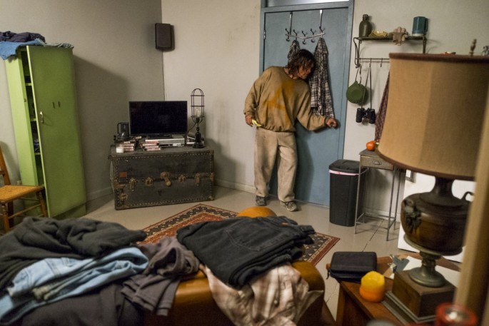 Daryl raids Dwight's room.