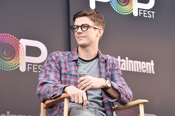 Grant Gustin speaks onstage during the CW Superheroes panel at Entertainment Weekly's PopFest at The Reef on October 29, 2016 in Los Angeles, California.