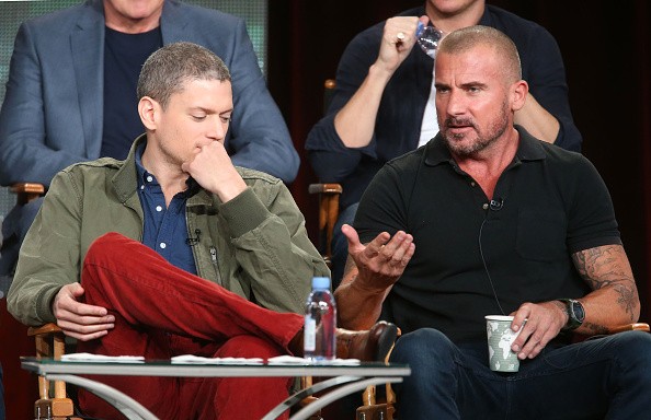 Actors Wentworth Miller (L) and Dominic Purcell speak onstage during the 'Arrow' and 'The Flash' panel as part of The CW 2015 Winter Television Critics Association press tour at the Langham Huntington Hotel & Spa on January 11, 2015 in Pasadena, Californi