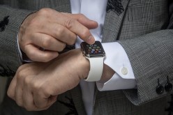 Hajime Shimada shows off his newly purchased Apple Watch outside boutique store, Dover Street Market Ginza on April 24, 2015 in Tokyo, Japan. 