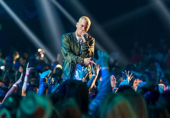 Eminem performs onstage at the 2014 MTV Movie Awards at Nokia Theatre L.A. Live on April 13, 2014 in Los Angeles, California.
