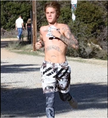 Justin Bieber strips off for a jog in Los Angeles.
