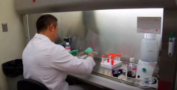 A researcher at work in a lab facility. 