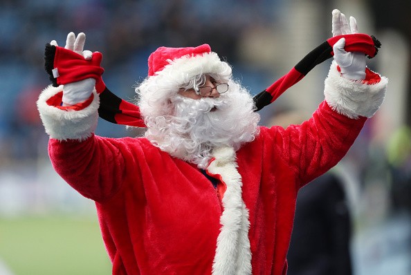 A man dressed up as Santa Claus spotted during a football match in the Scottish Premier League.