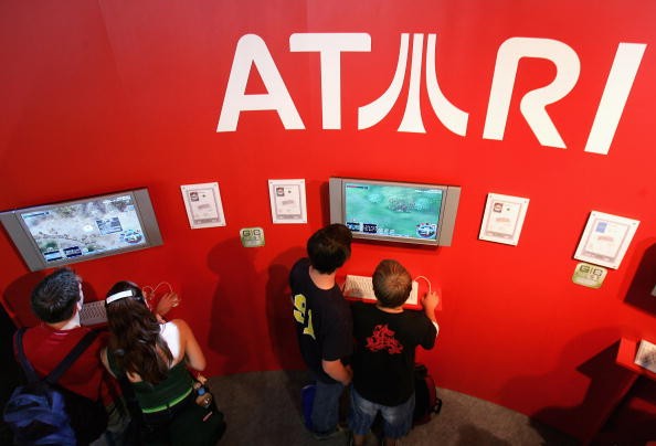 Gamers playing Atari video games during a video game convention held in Leipzig, Germany.