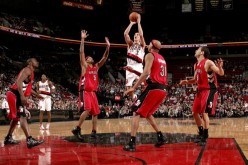 The Portland Trail Blazer's Steve Blake shoots over the Toronto Raptors defence in a tightly contested 96-94 Trail Blazers win back in Jan. 2006.