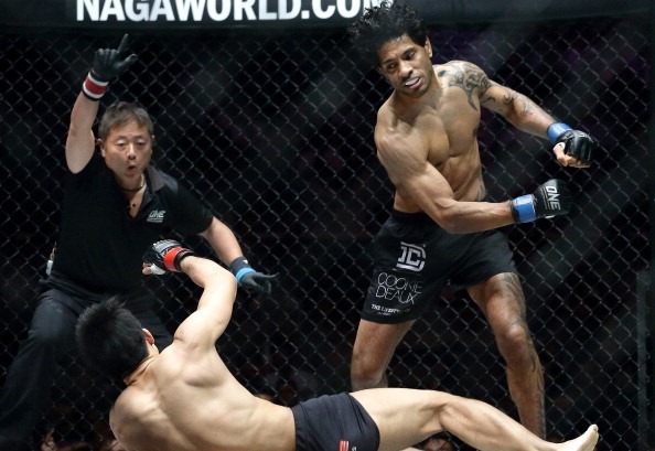 Vincent Latoel lands a strike that takes down Eddie Ng during their encounter at ONE FC 16.