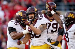 Drew Wolitarsky of the Minnesota Golden Gophers celebrates with teammates after scoring a touchdown in the second quarter against the Wisconsin Badgers at Camp Randall Stadium on November 26, 2016 in Madison, Wisconsin.