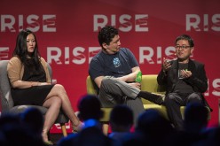 Xing Liu, partner at Sequoia Capital, right, speaks as Anna Fang, partner and chief executive officer of ZhenFund, left, and David Chao, co-founder and general partner of DCM Ventures, listen during the Rise conference in Hong Kong, China, on Tuesday, May