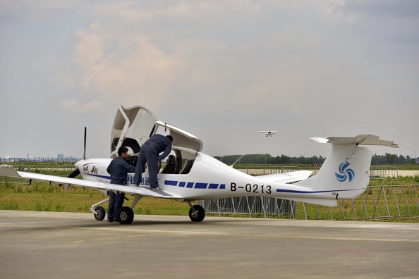 China's first domestically developed electrically powered light sport aircraft (Ruixiang - (RX1E) is displayed during a delivery ceremony at Faku Caihu airport on June 18, 2015 in Shenyang, Liaoning province of China. 