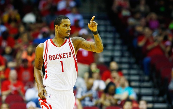 Trevor Ariza of the Houston Rockets celebrates a three-point basket against the Memphis Grizzlies during their game at the Toyota Center on March 14, 2016 in Houston, Texas.