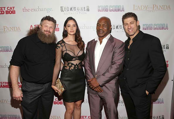 Roy Nelson, Sara Malakul Lane, Mike Tyson and Alain Moussi make an appearance at AFM 2016 to promote the film "Kickboxer: Retaliation."