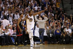 Kevin Durant of the Golden State Warriors reacts during their game against the Toronto Raptors at ORACLE Arena on December 28, 2016 in Oakland, California. 