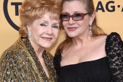 Actresses Debbie Reynolds (L), recipient of the Screen Actors Guild Life Achievement Award, and Carrie Fisher pose in the press room at the 21st Annual Screen Actors Guild Awards at The Shrine Auditorium on January 25, 2015 in Los Angeles, California. 