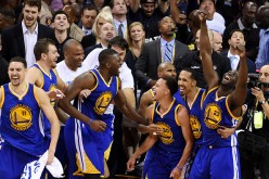Stephen Curry and the Golden State Warriors celebrate their 105 to 97 win over the Cleveland Cavaliers in Game Six of the 2015 NBA Finals at Quicken Loans Arena on June 16, 2015 in Cleveland, Ohio.