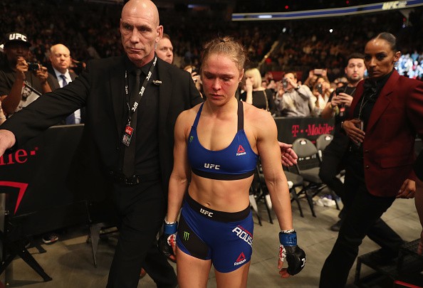 Ronda Rousey exits the Octagon after her loss to Amanda Nunes of Brazil in their UFC women's bantamweight championship bout during the UFC 207 event on December 30, 2016 in Las Vegas, Nevada.