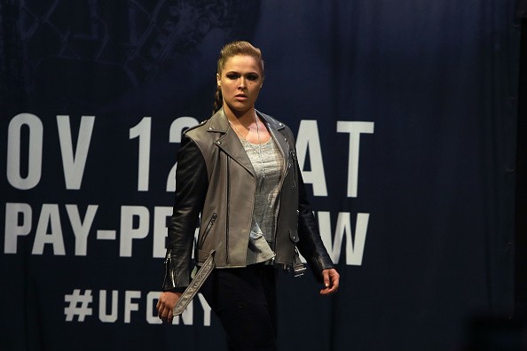 Ronda Rousey walks on stage for her face off with UFC Women's Bantamweight Champion Amanda Nunes after UFC 205 Weigh-ins in preparation for their UFC 207 fight that will take place on December 30, 2016 at Madison Square Garden