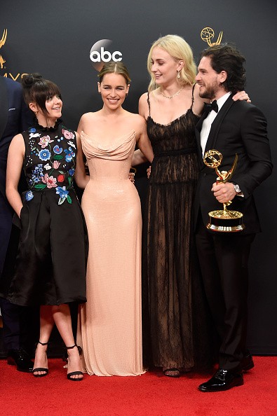 Maisie Williams, Emilia Clarke, Sophie Turner and Kit Harington, winners of Best Drama Series for 'Game of Thrones', pose in the press room during the 68th Annual Primetime Emmy Awards at Microsoft Theater on September 18, 2016 in Los Angeles, California.