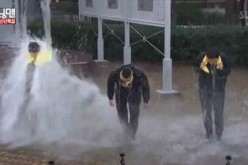 'Running Man' producers doused in water as punishment during the Jan. 1 episode of the SBS variety program.