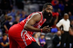 James Harden of the Houston Rockets looks on while playing the Detroit Pistons at the Palace of Auburn Hills on November 21, 2016 in Auburn Hills, Michigan.