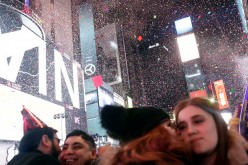 Confetti falls as people celebrate New Year's eve in Times Square in New York City just after midnight on January 01, 2017. 