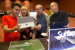 A Microsoft employee showcases the Surface tablet computer at the 2016 Microsoft Annual Shareholders Meeting held last Nov. 30, 2016.