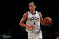 Jeremy Lin of the Brooklyn Nets dribbles up the court during first half of the preseason game against the Boston Celtics at Barclays Center on October 13, 2016 in New York City.