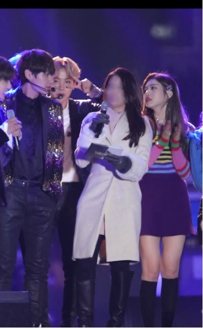 BTS' V and Red Velvet's Joy caught staring at each other on stage during a recent year-end event.
