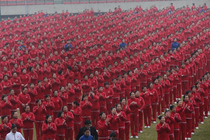 Fifty thousand citizens perform square dance to make a Guinness World Record with dancers in other 13 cities on Nov. 7, 2016, in Zhengzhou, China. 