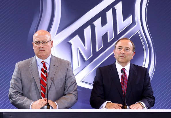 Deputy NHL Commissioner Bill Daly (left) and commissioner Gary Bettman are eyeing the untapped Chinese market for NHL games. 