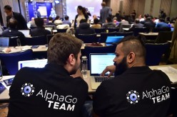 AlphaGo team members sit in a press room for the Google DeepMind Challenge Match at a hotel in Seoul.