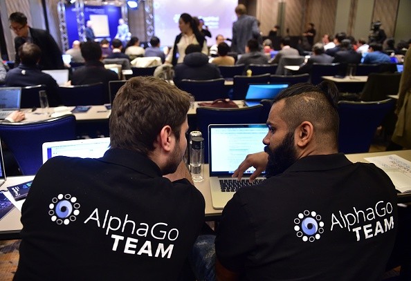 AlphaGo team members sit in a press room for the Google DeepMind Challenge Match at a hotel in Seoul.