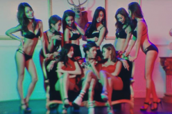 Ravi surrounded by lingerie-clad women in the controversial scene from the MV of his recent release, 