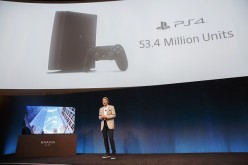 Kazuo Hirai, president and chief executive officer of Sony Corp., stands next to a Sony Sony XBR-A1E Bravia OLED 4K HDR TV while speaking about the PlayStation 4 (PS4) game console during the company's press event at the 2017 Consumer Electronics Show (CE
