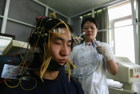 A young Chinese Internet addict receives an electroencephalogram check at the Beijing Military Region Central Hospital.
