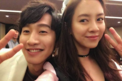Lee Kwang Soo and Song Ji Hyo take a selfie on the set of the SBS variety show 'Running Man.'