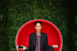 Lindy Klim poses inside a meditation pod in Martin Place during the Virgin Mobile and Smiling Mind partnership launch 