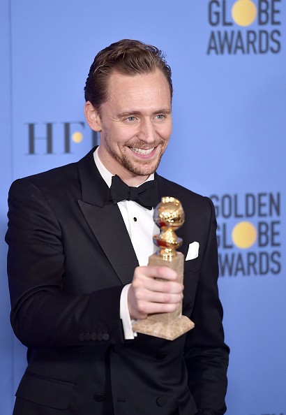 Actor Tom Hiddleston, winner of Best Actor in a Miniseries or Television Film for 'The Night Manager,' poses in the press room during the 74th Annual Golden Globe Awards. 